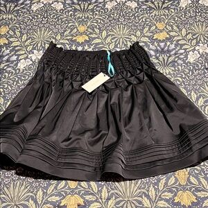 Leon Max limited edition HIGH QUALITY black mini skirt NWT Sz 6